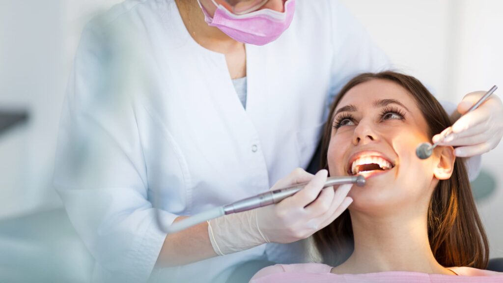 Patient smiling during a check-up with a local dentist in Christchurch